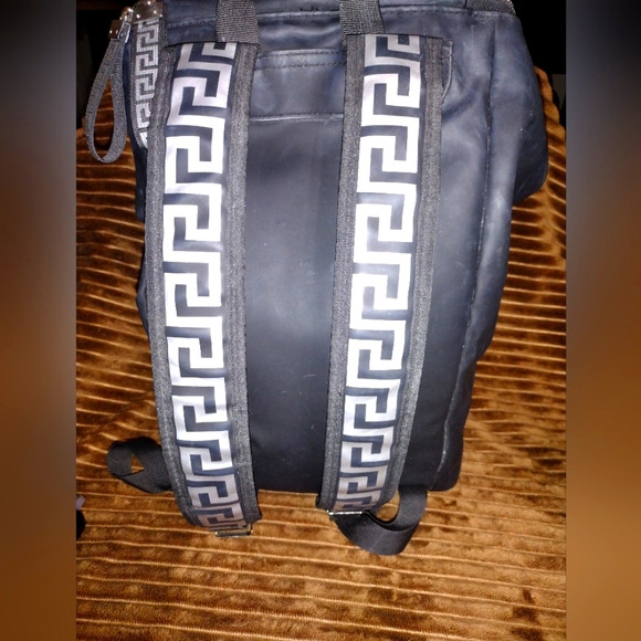 Versace Handbags - Versace perfums backpack bag Medusa logo EUC huge no tears or stains